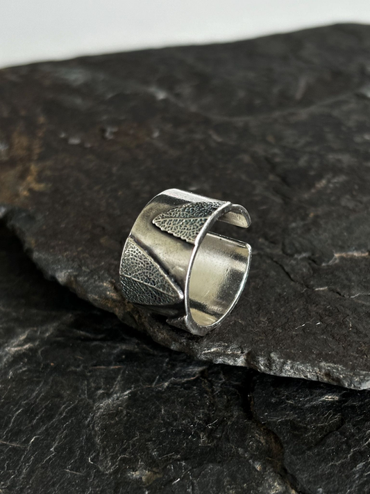 Thumb ring with sage leaf texture. Recycled sterling silver, crafted in Ireland, shipped across Europe